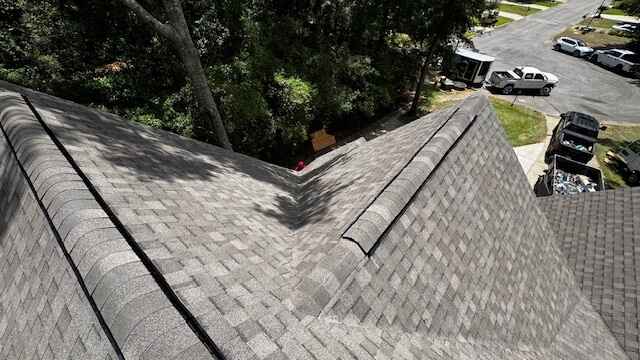 Dothan roofing project, before and during