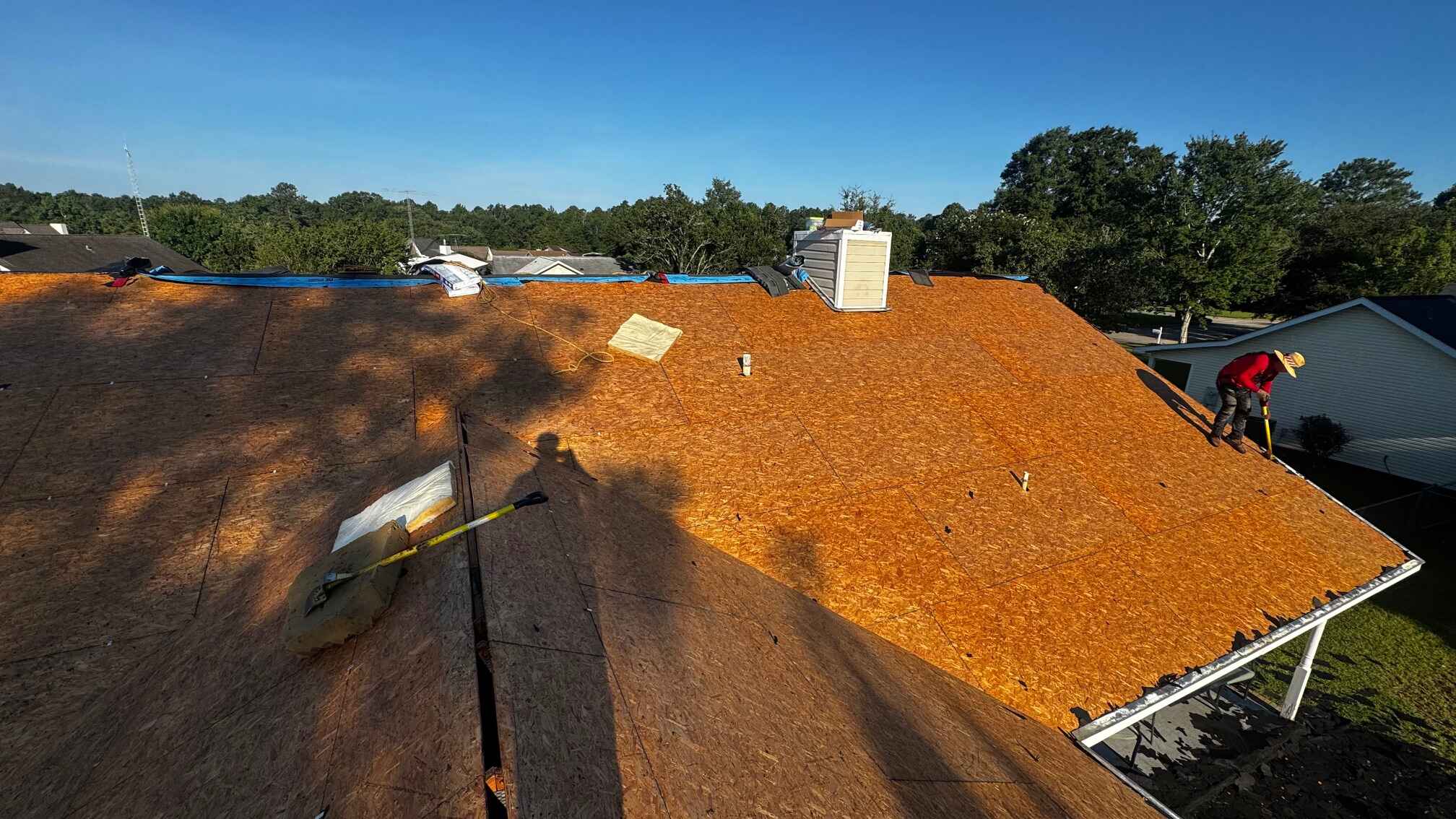 Roof work underway on a Dothan, AL house